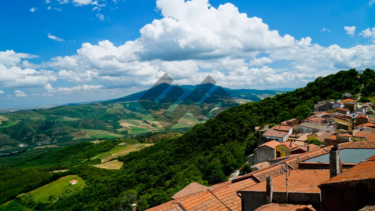 Picture of Alpine Roofing Landscape with Summer Clouds