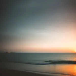Sunset Serenity: Vibrant Beach Horizon at Dusk
