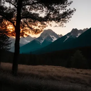 Majestic Peak Nestled Among Snow-Capped Mountains