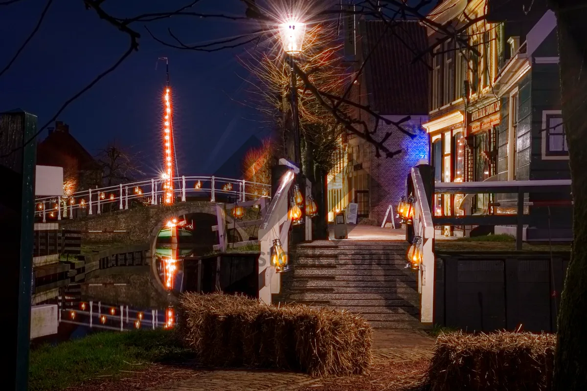 Picture of Night city skyline with old architecture and street lighting.