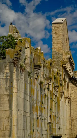 Historic English Cathedral Tower in City Skyline.