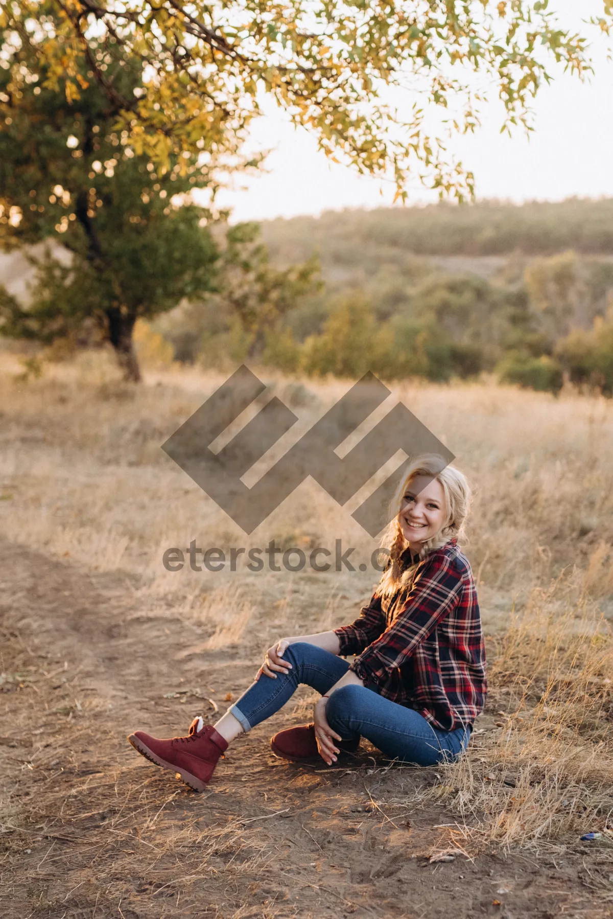 Picture of Smiling man and child in summer meadow.