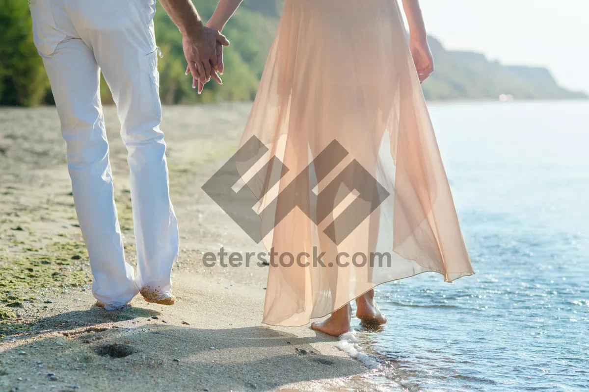 Picture of Tropical vacation: Happy woman relaxing on the beach