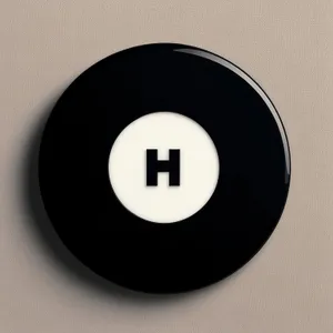 Shiny black button icon on round device.