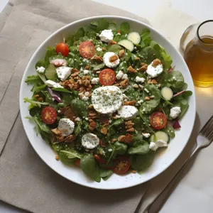 Delicious and healthy vegetable salad with cheese and nuts.