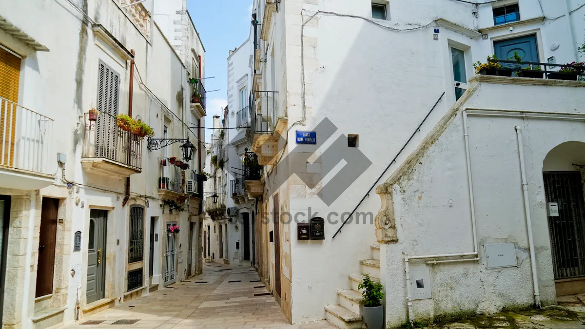 Picture of Ancient monastery in urban cityscape with old houses