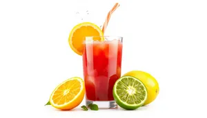 Tropical fruit juice glass with lemon and lime slice.