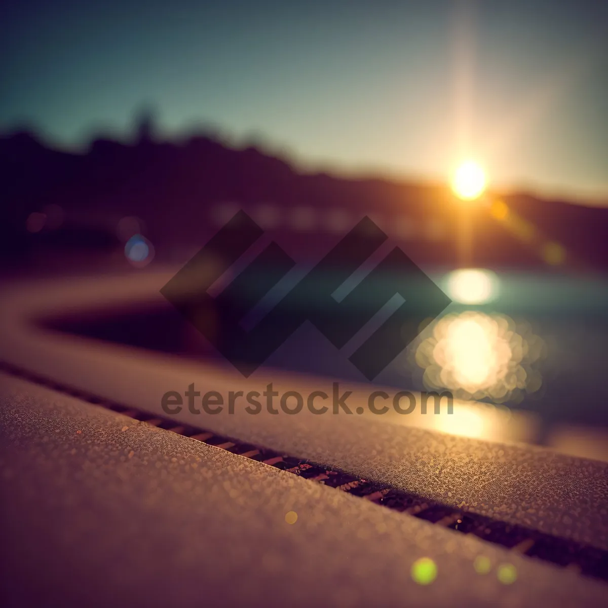 Picture of Sunset reflections on car mirror, capturing the sky's colorful light