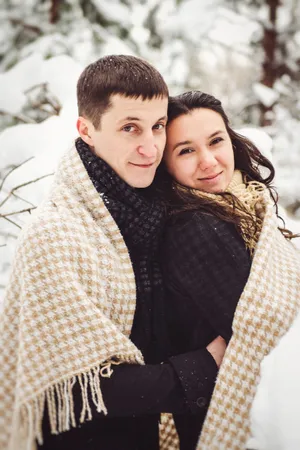 Smiling Couple Outdoors Enjoying a Fun Moment