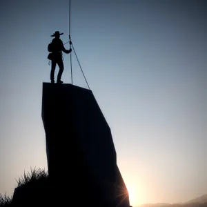 Golden Sunset Silhouette on Cable T-Bar Lift