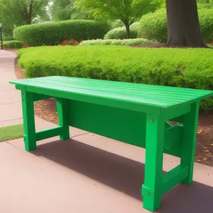 Wooden Park Bench on Green Grass