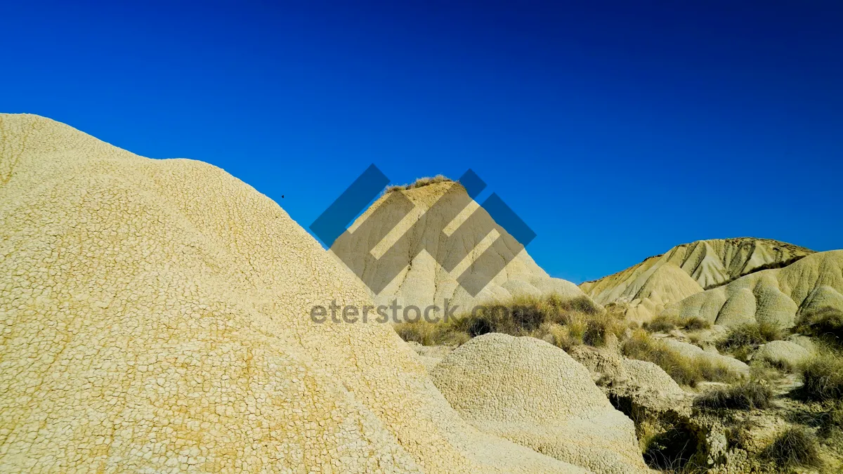 Picture of Scenic mountain landscape with rock formations and desert terrain