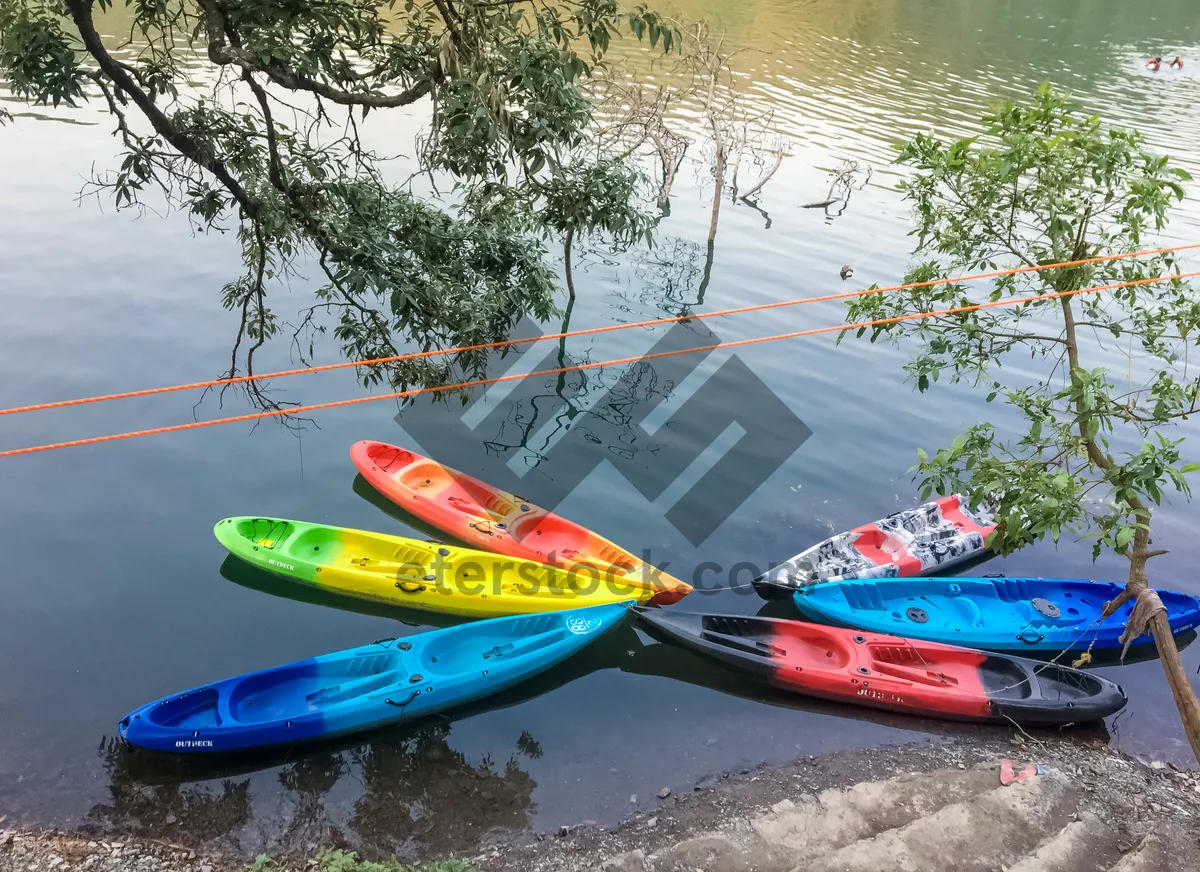 Picture of Beach vacation with small speedboat on tranquil waters.