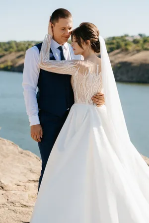 Happy bride and groom posing on wedding day