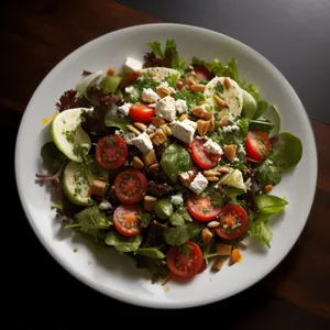 Fresh summer salad with tomatoes and olives.