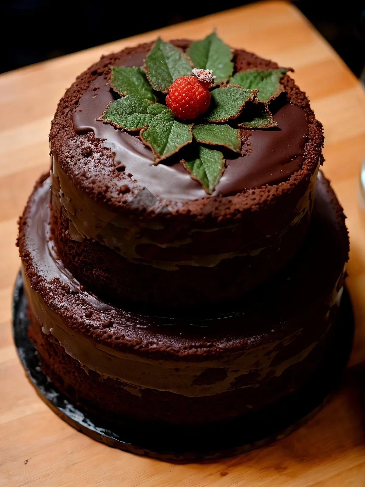 Picture of Delicious Berry Chocolate Cake with Fresh Mint