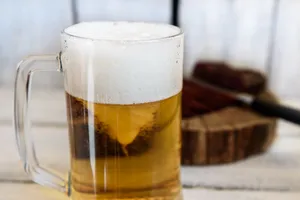 Refreshing cold beer in amber pint glass