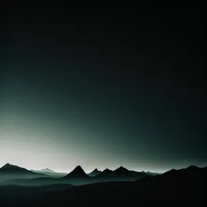 Vibrant Sunset Over Majestic Mountain Landscape