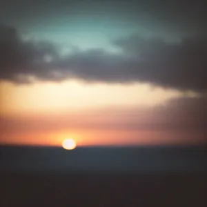 Vibrant Sunset Over Ocean Horizon