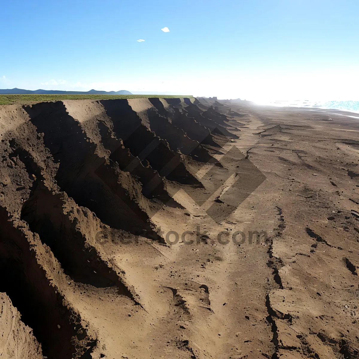 Picture of Serene Desert Landscape: Majestic Dunes and Rocky Mountains