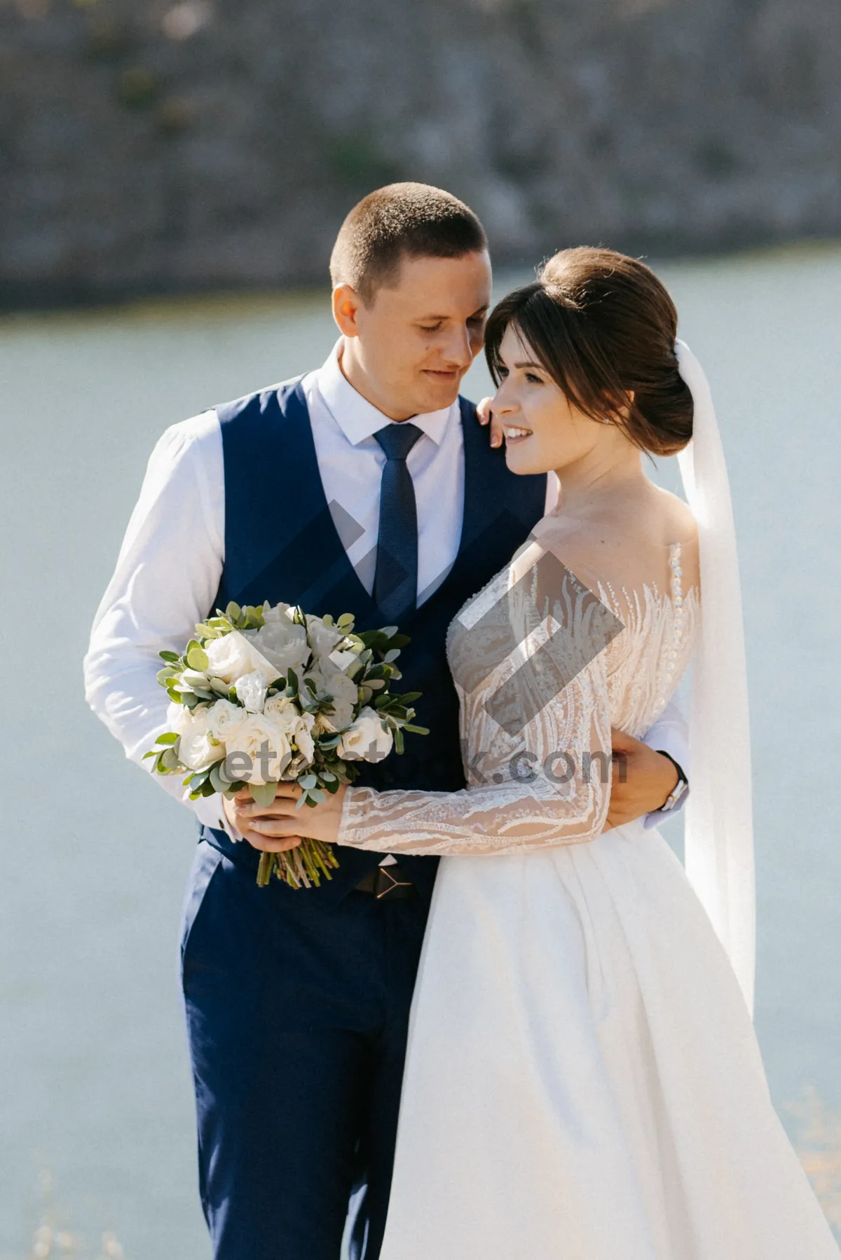 Picture of Wedding Couple Smiling Outdoors in Love and Happiness