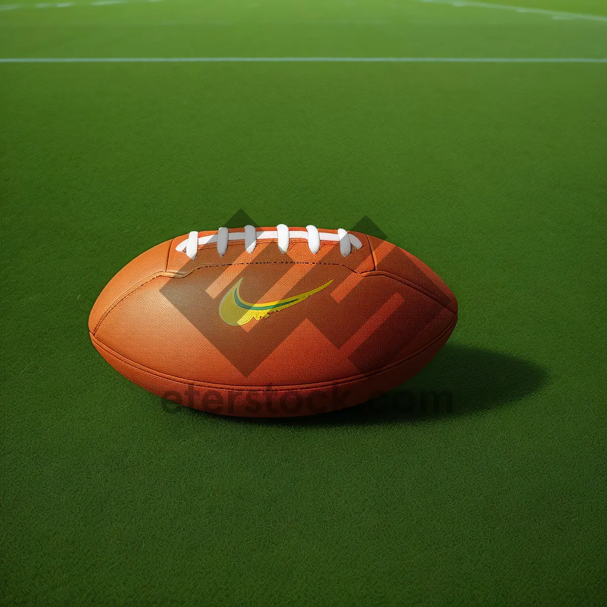 Picture of Game-ready rugby ball on grass field