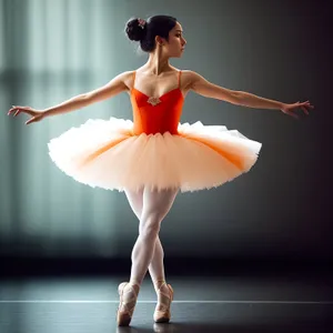 Elegant ballet dancer in beautiful dress, posing gracefully.