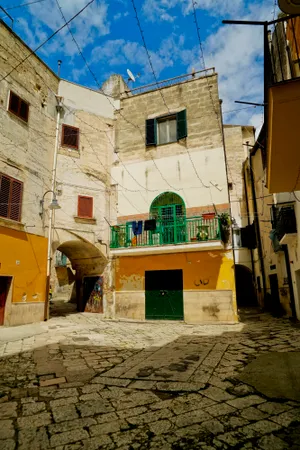 Ancient urban building with stone walls and windows