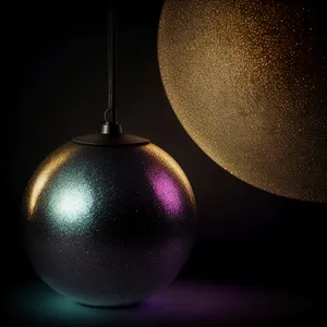 Golden Festive Bauble Hanging from Decorative Tree