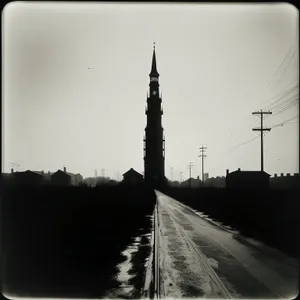 Sky-high Minaret: Majestic Mosque Tower Amidst Historic Architecture