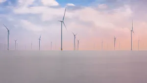 Renewable energy wind turbines in the sky landscape.