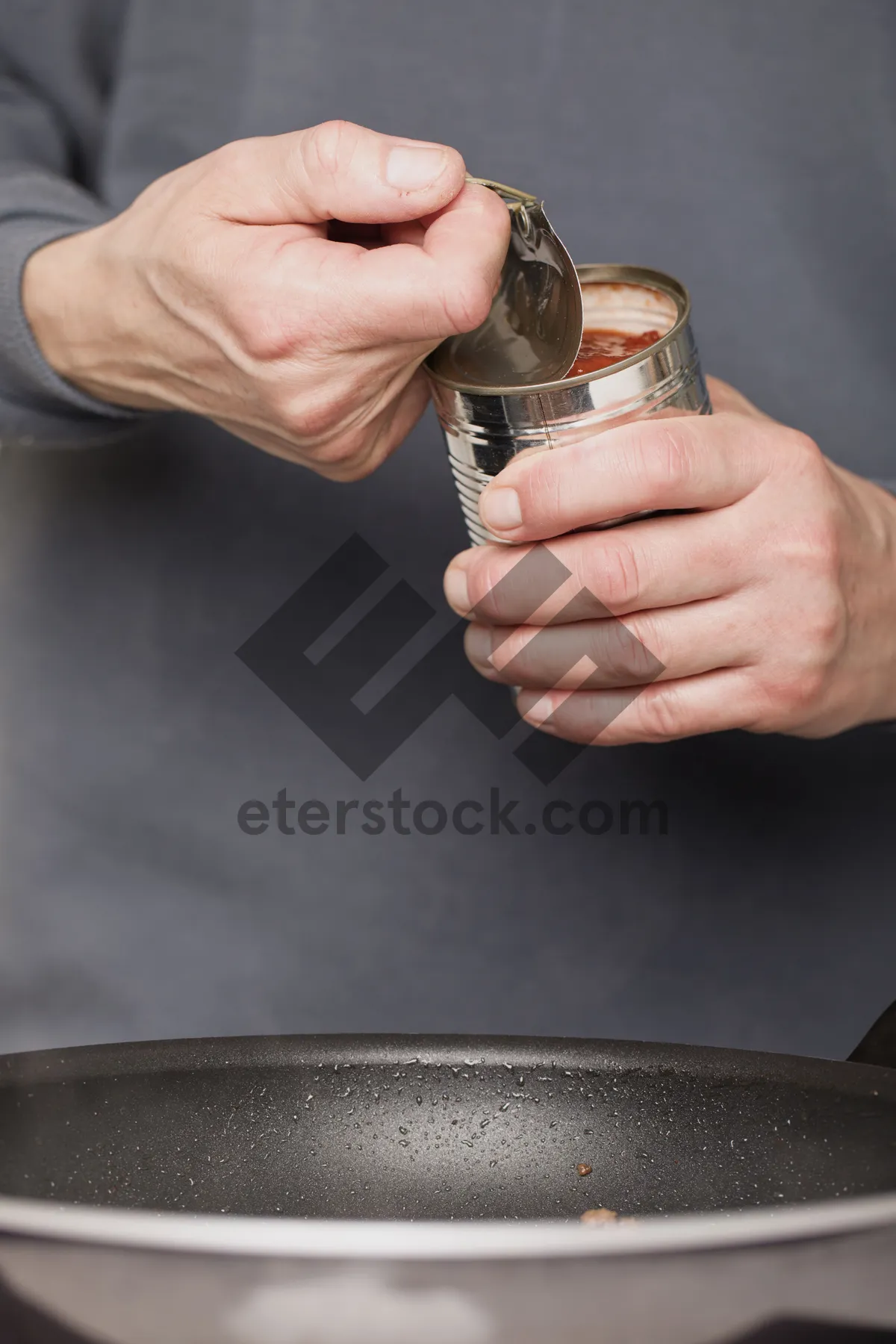 Picture of Man holding glass cup with strainer