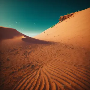 Scorching Sahara: Majestic Dunes Under Moroccan Sun