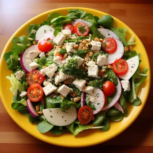 Fresh, gourmet vegetable salad with cheese and tomatoes.