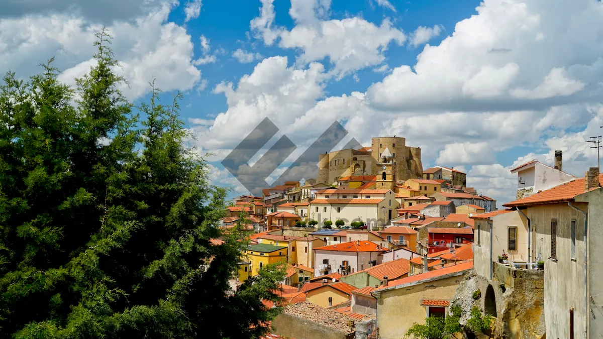 Picture of City skyline with ancient church and castle towers.