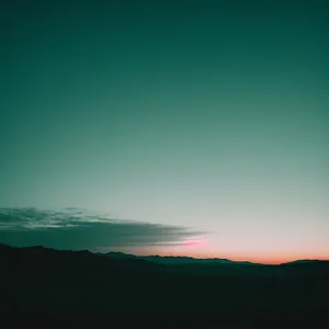 Dramatic Summer Sunset Over Cape's Scenic Mountain Landscape