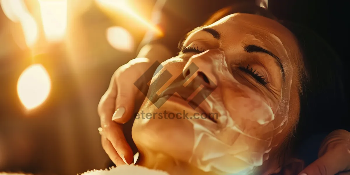 Picture of Attractive lady receiving sensual massage at health spa.