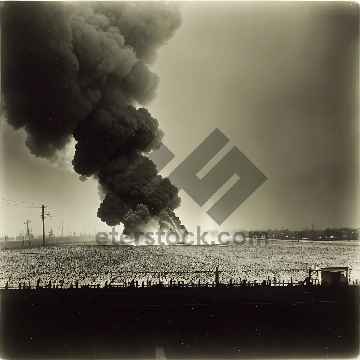 Picture of Industrial Smoke Tower Against Skyline: Powering the Factory