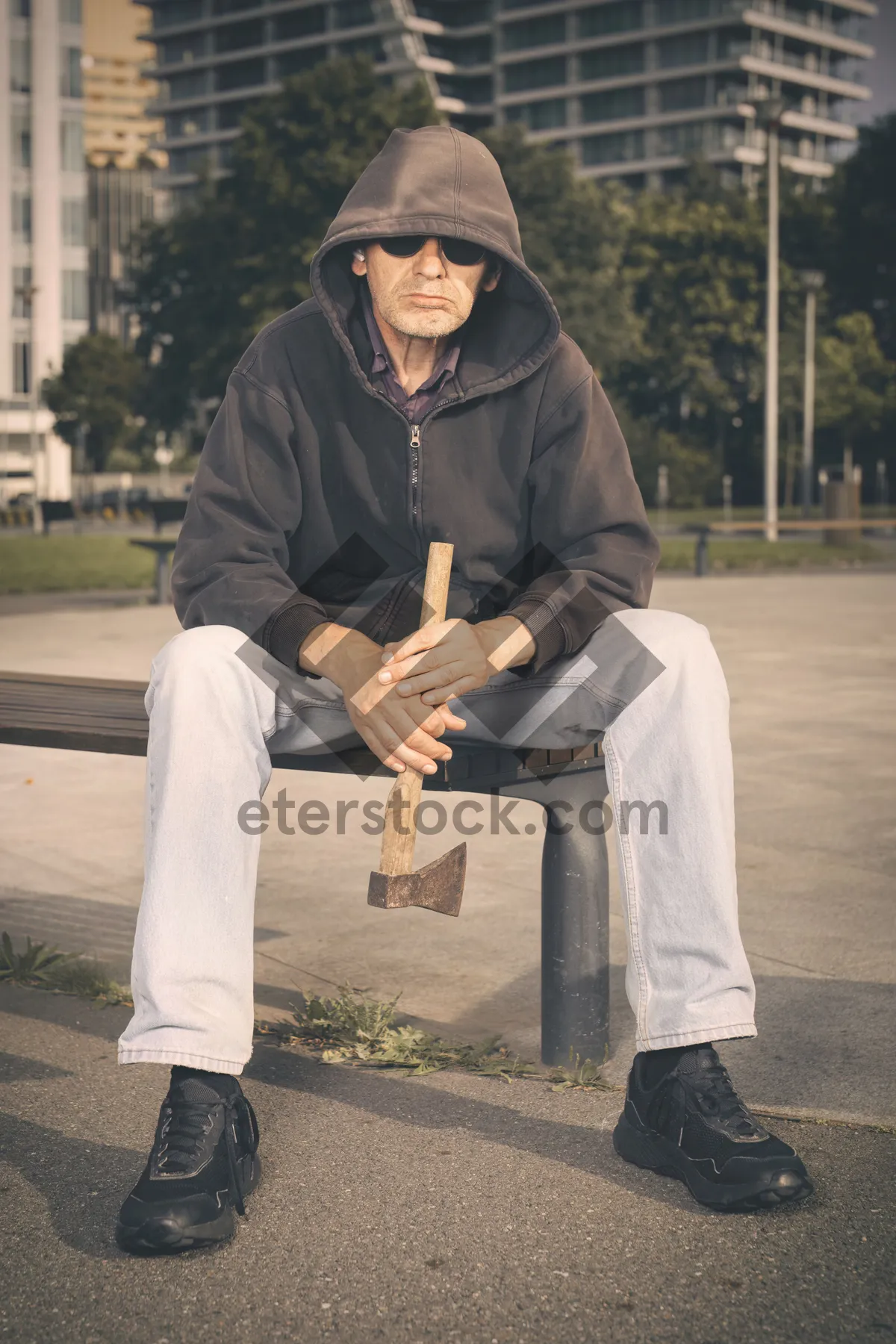 Picture of Happy smiling man in white clothing at park scholar