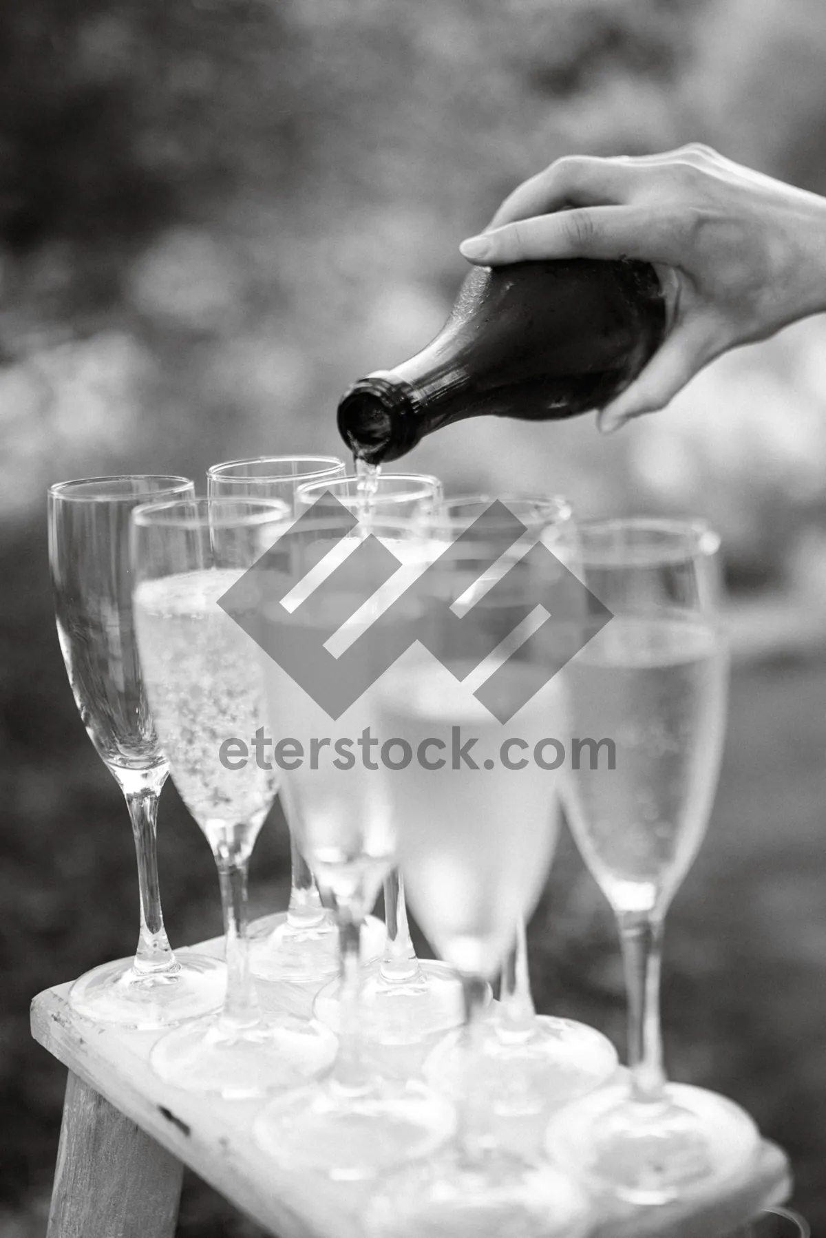 Picture of Party table with glassware and wine bottles