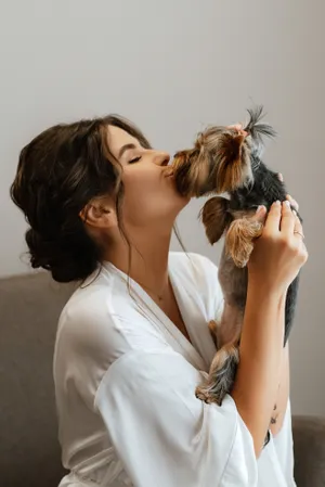 Attractive brunette couple smiling in happy embrace