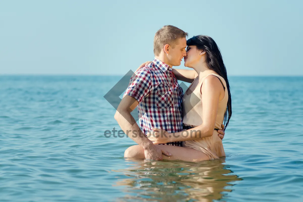 Picture of Happy Couple Enjoying Tropical Vacation on Beach