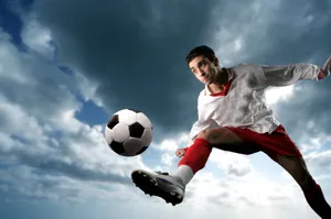 Vibrant soccer ball on bright grass field