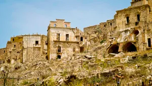 Ancient castle fortress overlooking historic city skyline