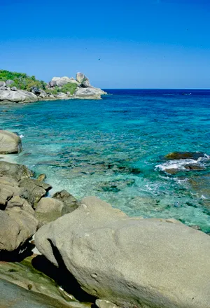 Tropical Paradise Beach on Cape Island Coastline. The colors and crystal clear water of the archipelago of the Similan Islands National Park, Thailand, Asia