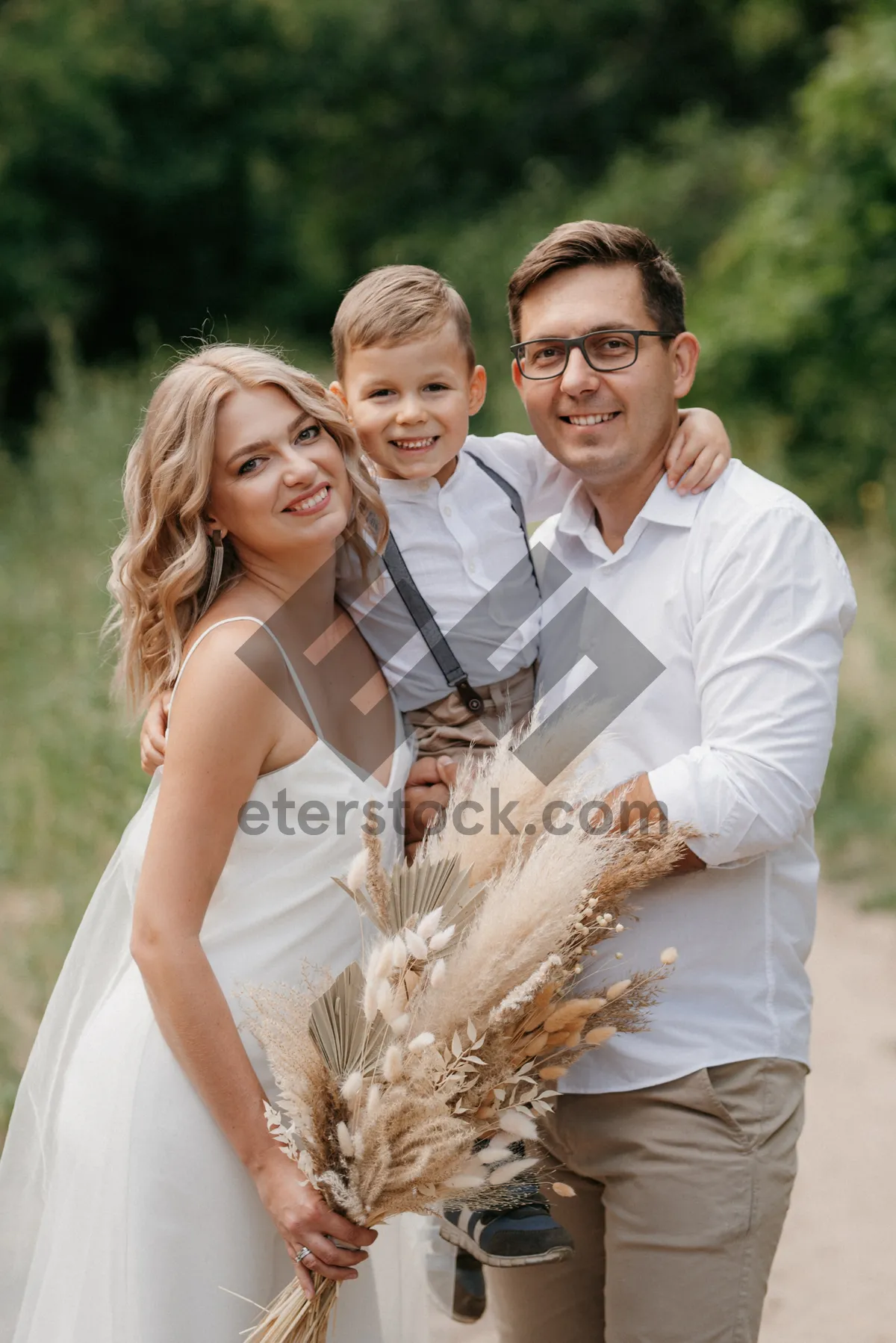 Picture of Happy wedding couple in the park