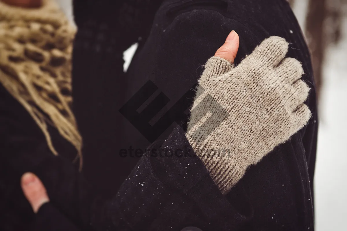 Picture of Man wearing glove and mitten on finger