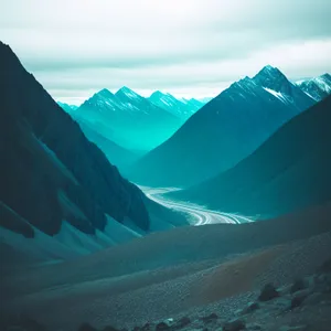 Snow-capped Glacial Mountains Reflecting in Pristine Lake