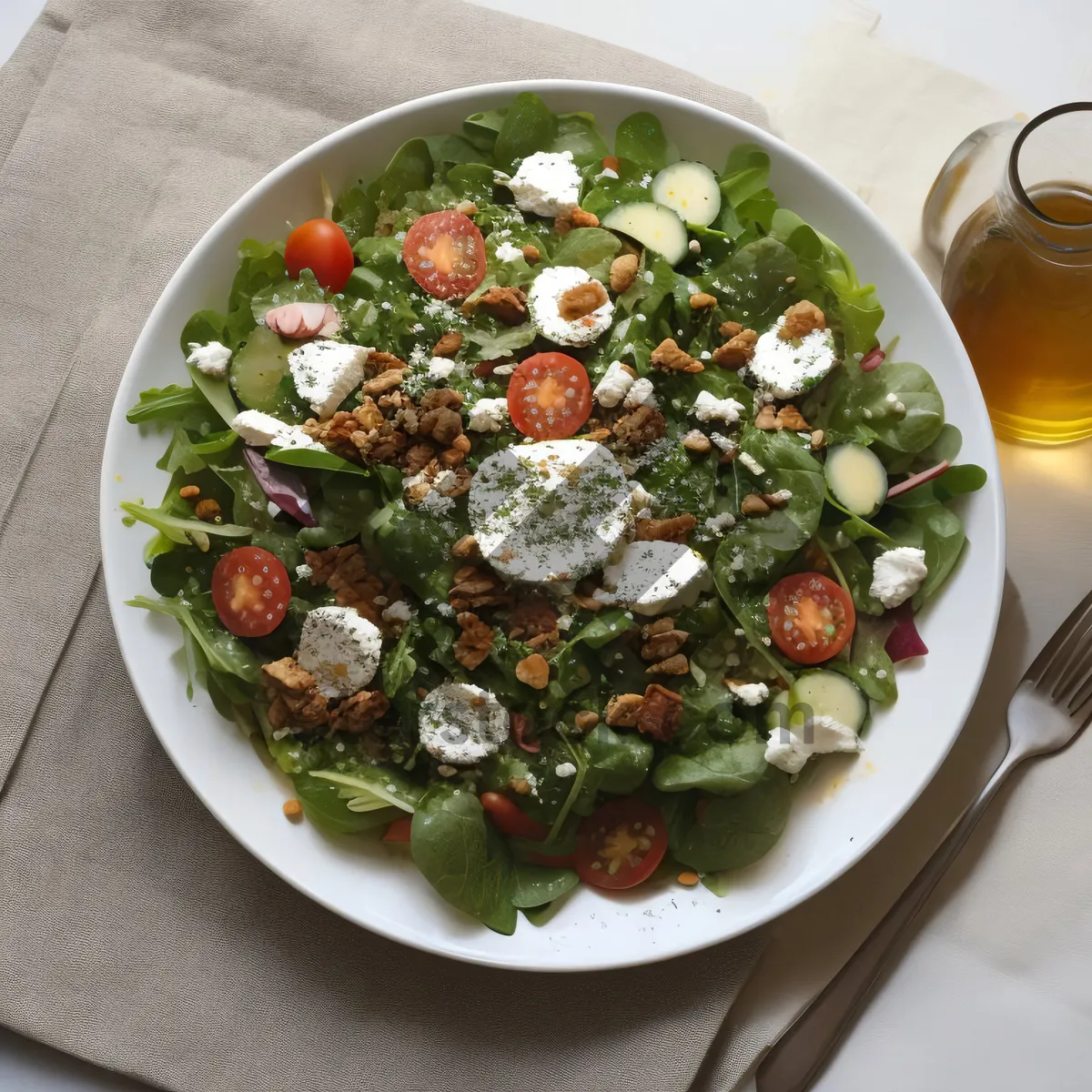 Picture of Delicious and healthy vegetable salad with cheese and nuts.