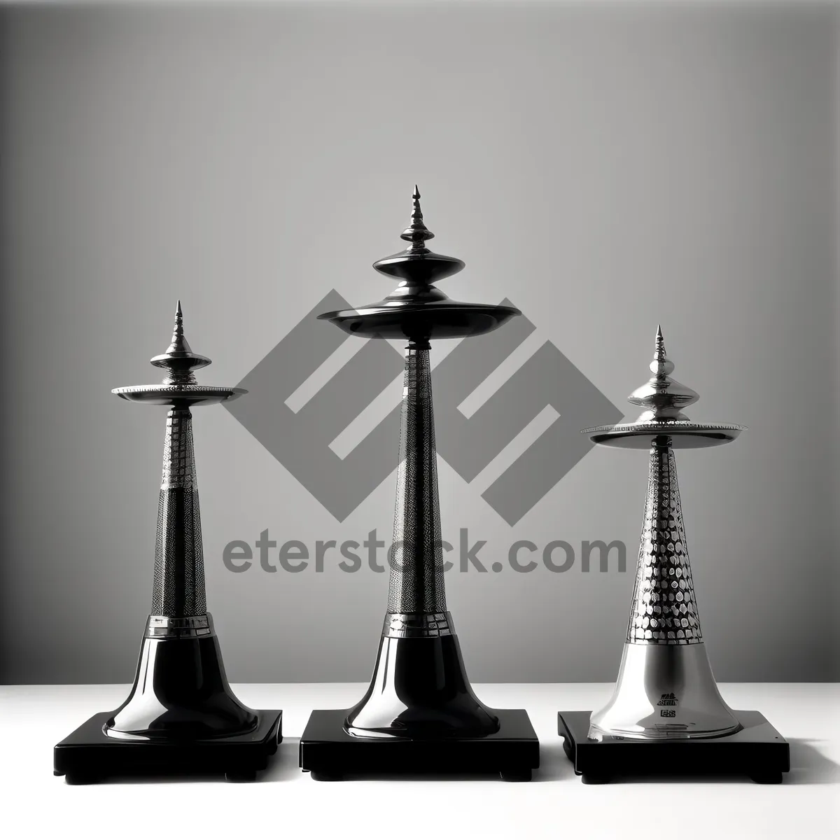 Picture of Black chess pieces on wooden board in play